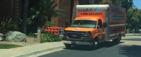 water-damage-restoration-truck-at-job-location