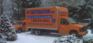 Water Damage Restoration Truck At Job Site